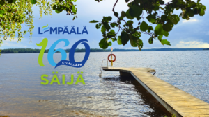 Säijän rantamaisema ja laituri järvellä, kuvan päällä teksti ”Lempäälä 160 kylillään”.